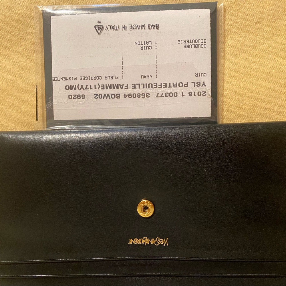 Yves Saint Laurent Black Leather Clutch with Gold Detail  NEW